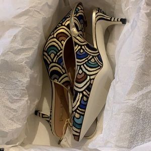 Gold/white/pattern. Brand new Pollini heels